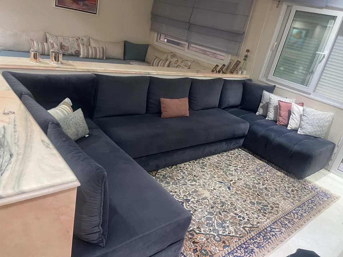 Salon en U bon état 