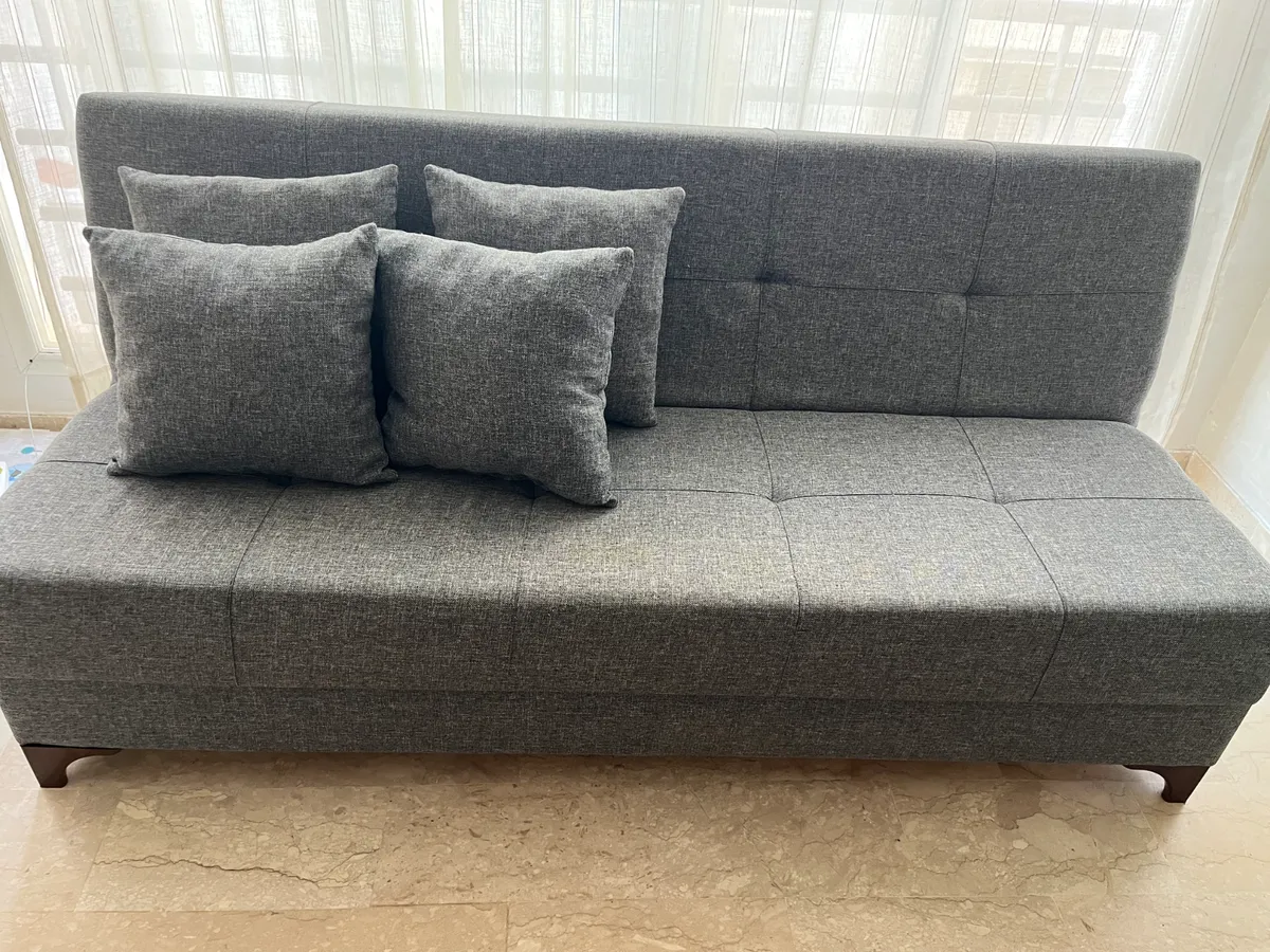 Canapé-lit KITEA SURF gris + coffre + 4 coussins – Très bon état